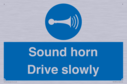 sound-horn-drive-slowly-warehousing-and-delivery-sign~